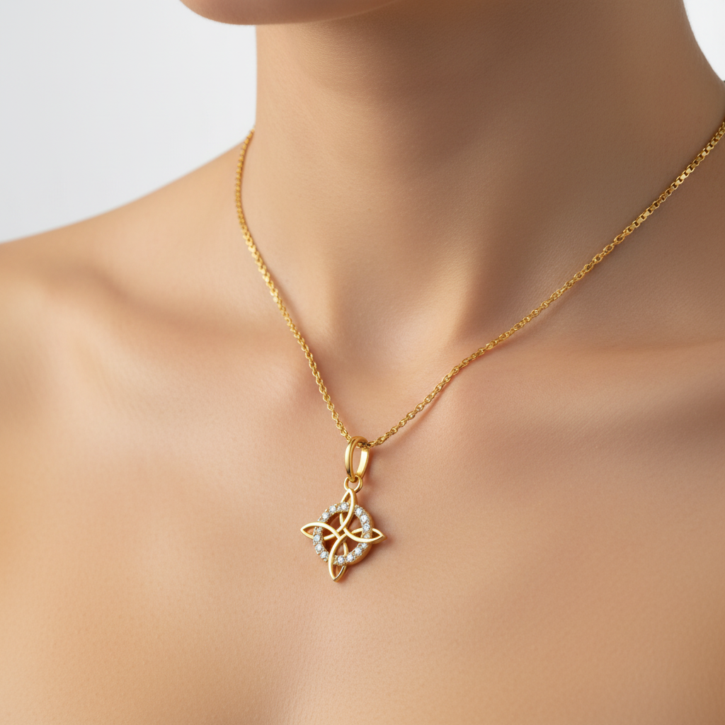 Dije Nudo de Bruja con Zirconia en Oro de 14K